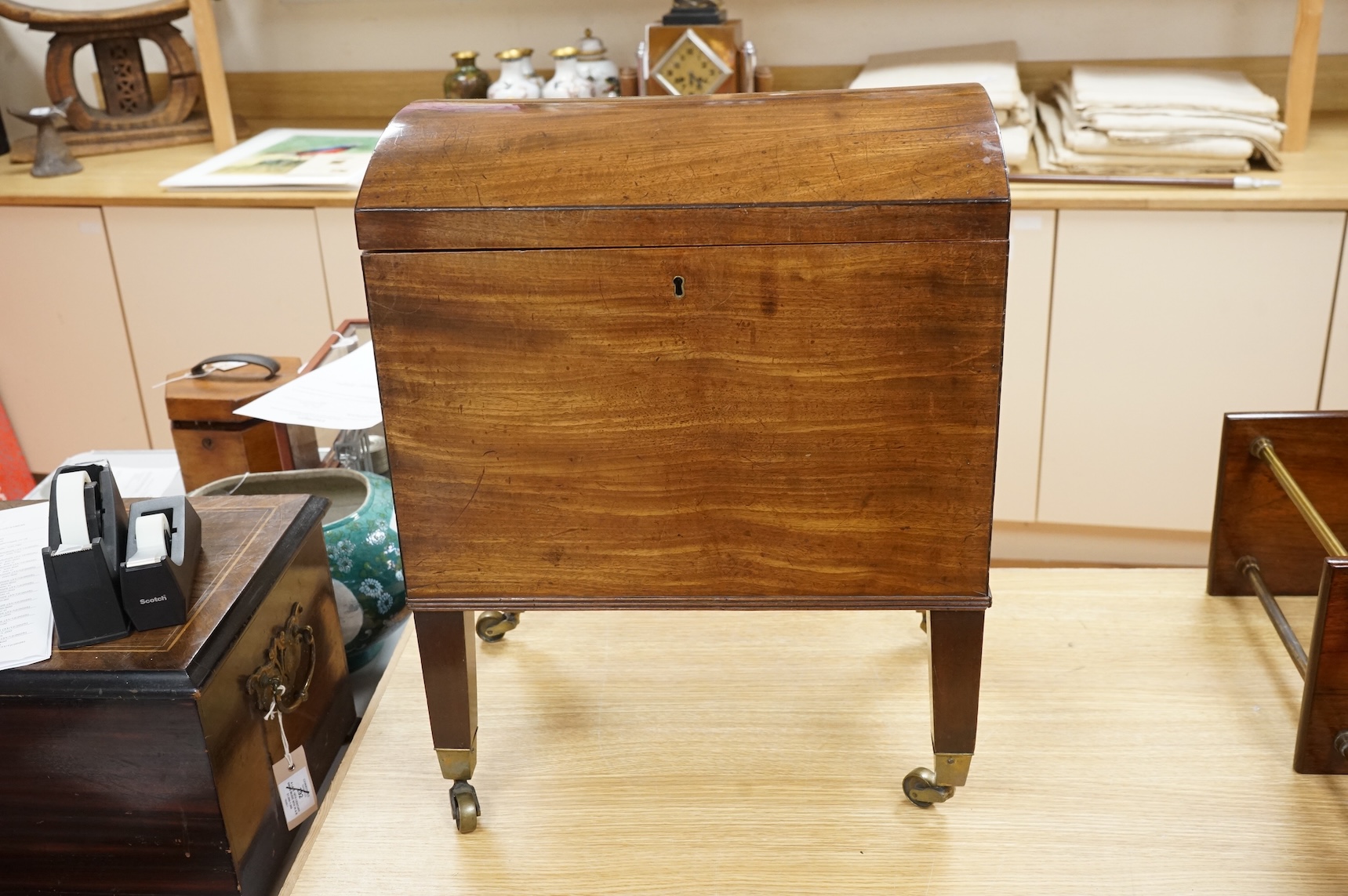 A George III domed mahogany cellarette, 54cm high